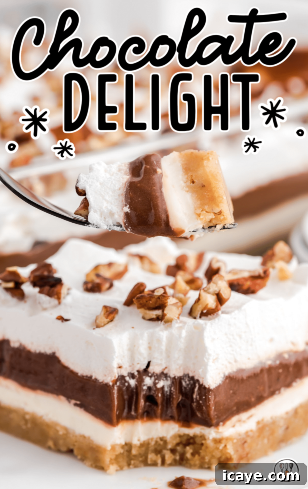 Heavenly Bites Recipes 6 A rich Chocolate Delight dessert, with visible layers and a generous whipped topping.