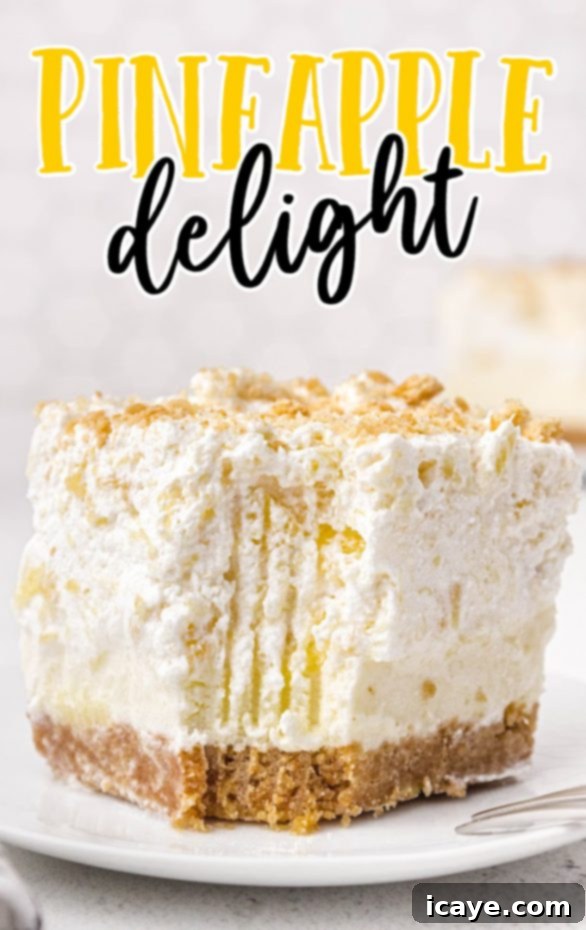 Heavenly Bites Recipes 3 A vibrant Pineapple Delight dessert, showcasing its golden pineapple topping.