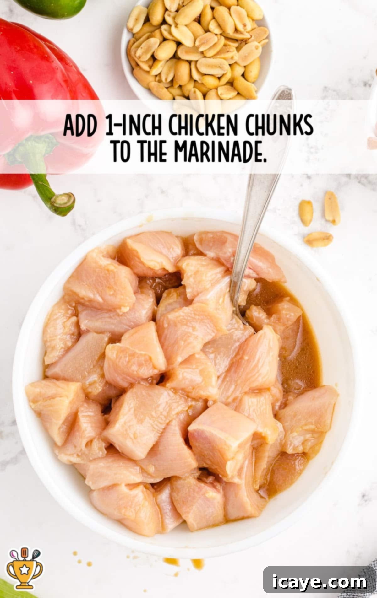 Sichuan Chili Peanut Chicken 4 chicken chunks added to a bowl